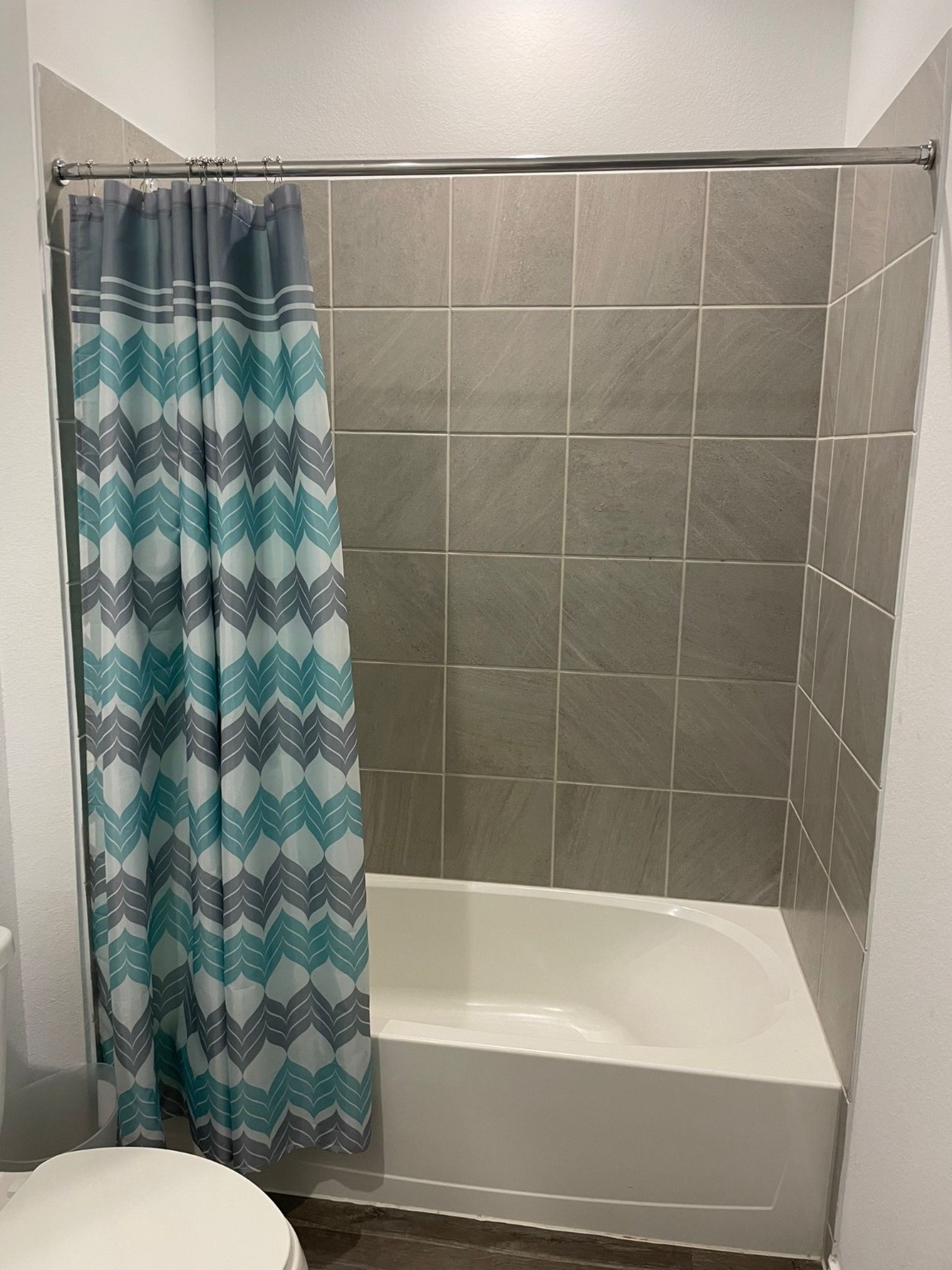 24443 Springfield Valley Drive Spring, TX 77373 - Photo 8 of 10 a bathroom with a bathtub and toilet