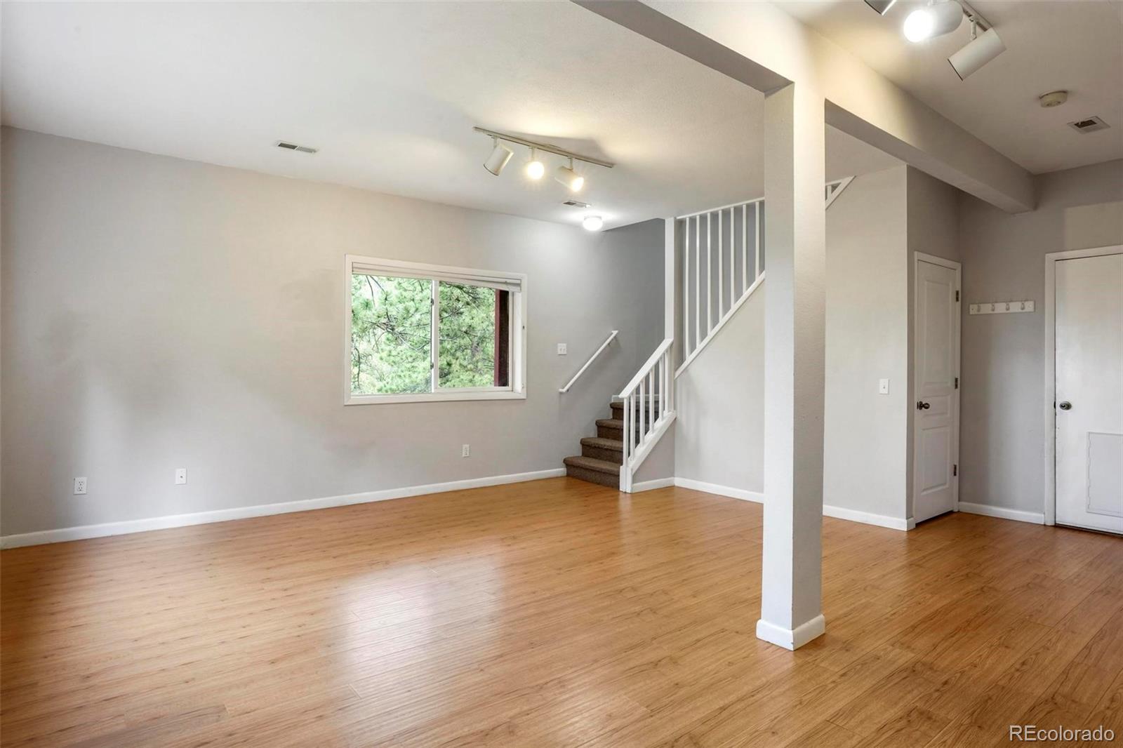 13519 Elsie Road Conifer, CO 80433 - Photo 19 of 31 a view of entryway and hall with wooden floor
