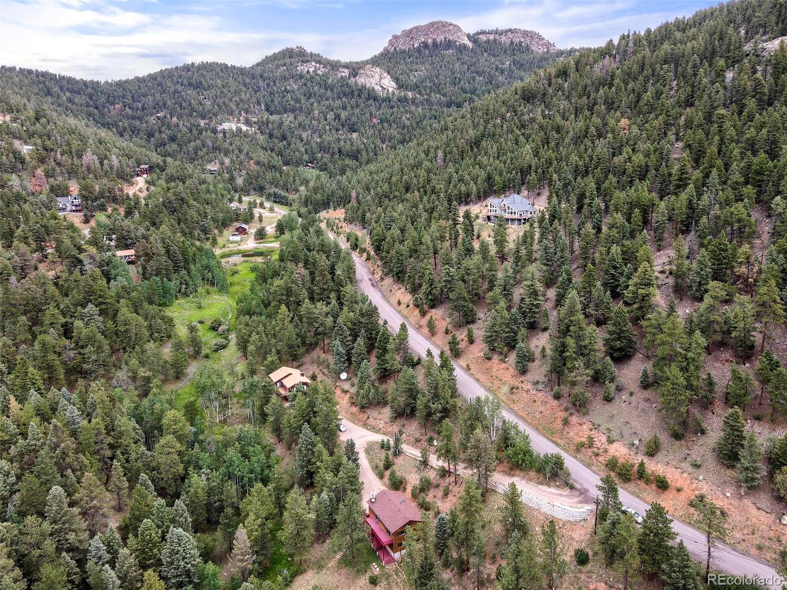 13519 Elsie Road Conifer, CO 80433 - Photo 28 of 31 an aerial view of city and mountain
