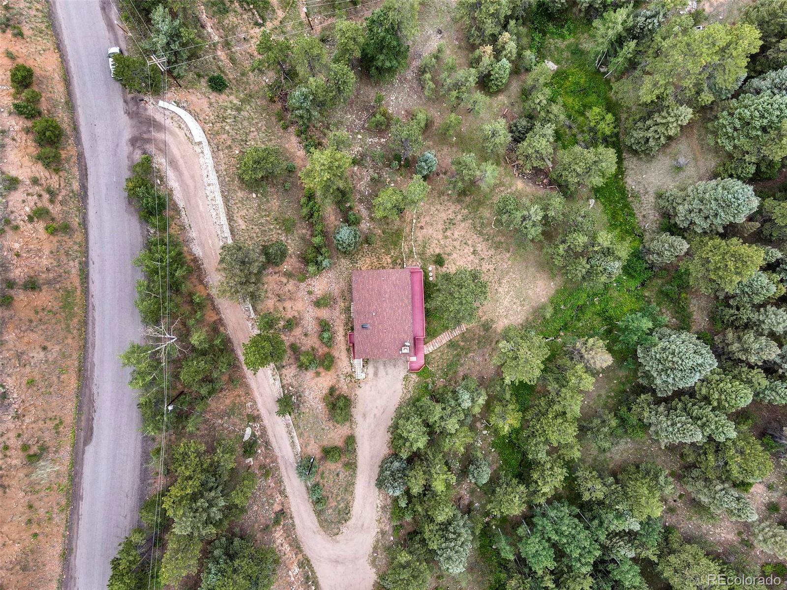13519 Elsie Road Conifer, CO 80433 - Photo 29 of 31 an aerial view of a house with a yard