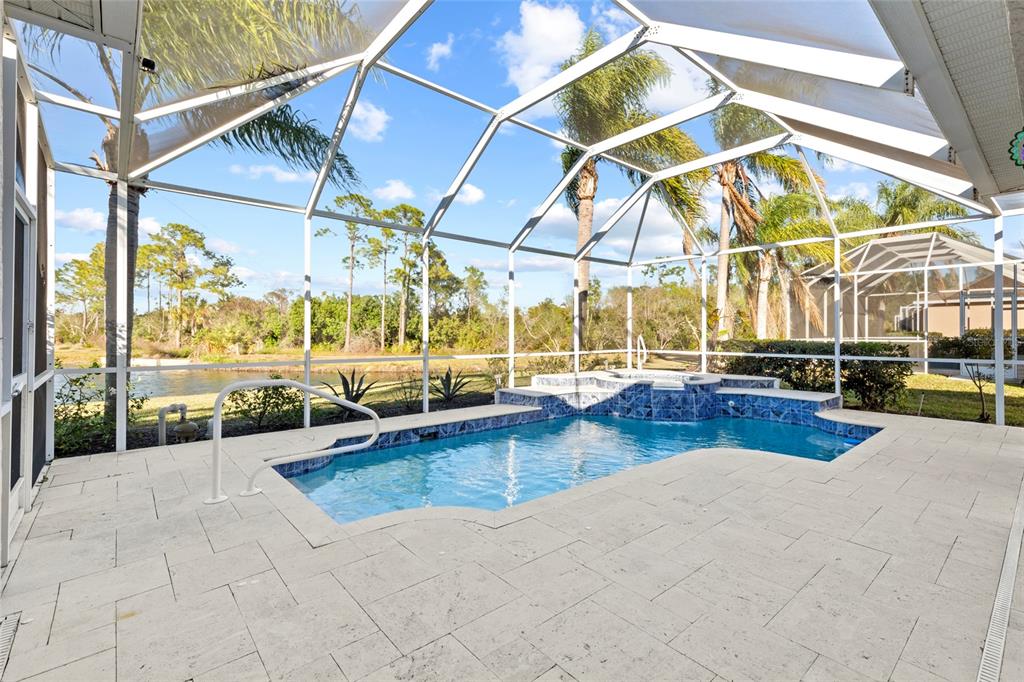 11011 Water Lily Way Lakewood Ranch, FL 34202 - Photo 18 of 24 a view of a swimming pool with a patio