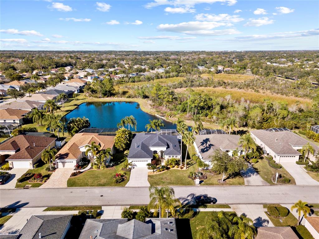 11011 Water Lily Way Lakewood Ranch, FL 34202 - Photo 21 of 24 an aerial view of residential houses with outdoor space