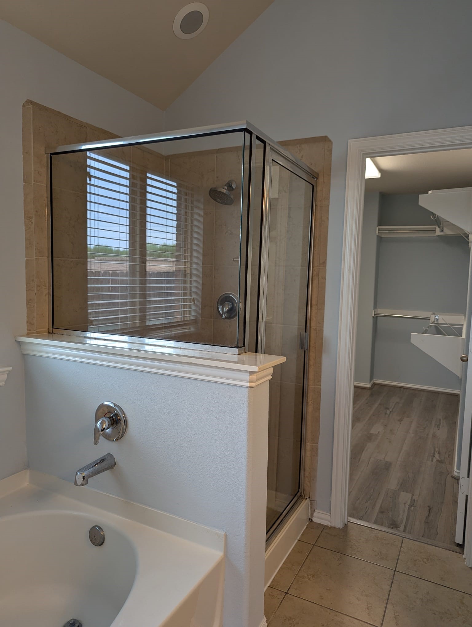 8041 Silent Deep Drive Rosenberg, TX 77469 - Photo 15 of 24 Elegant Ensuite with Glass-Enclosed Shower and Soaking Tub
