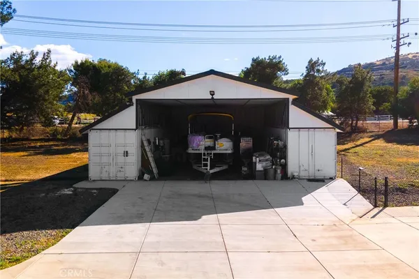an aerial view of residential house and outdoor space
