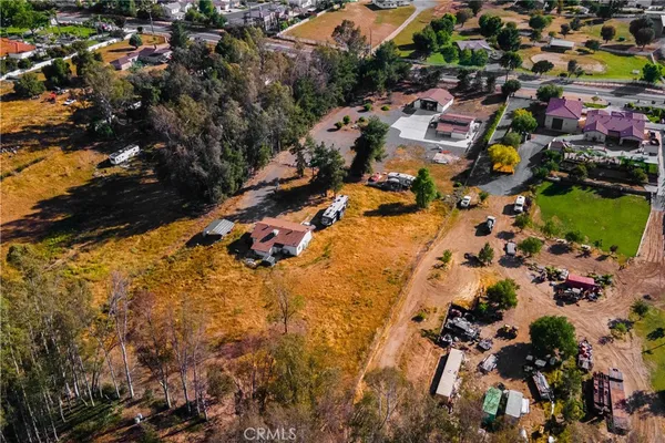 an aerial view of houses with yard