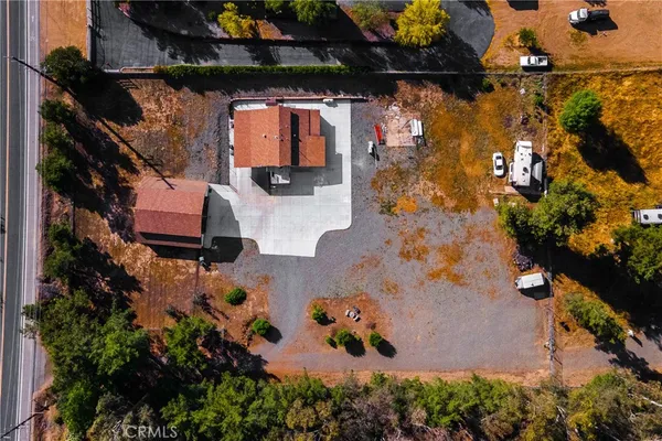 an aerial view of residential houses and outdoor space