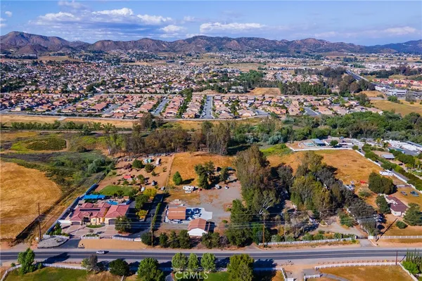 an aerial view of a house with a garden