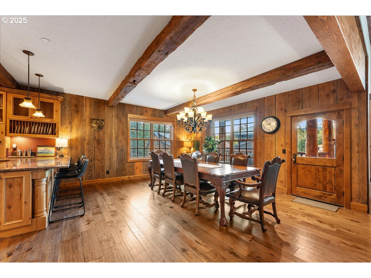 30930 Tyrolean Lane Government Camp, OR 97028 - Photo 13 of 42 a view of a dining room with furniture and wooden floor