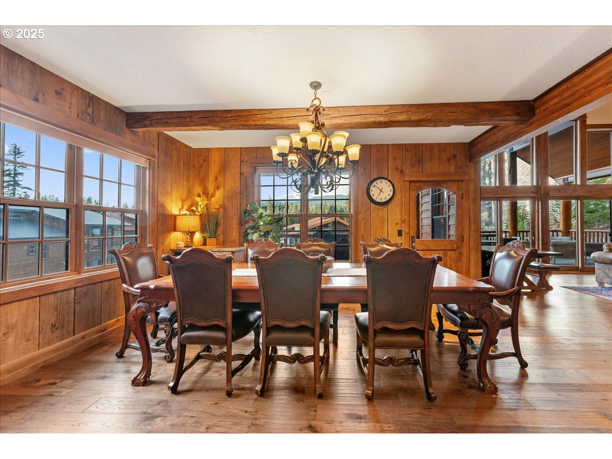 30930 Tyrolean Lane Government Camp, OR 97028 - Photo 14 of 42 a view of a dining room with furniture window and wooden floor