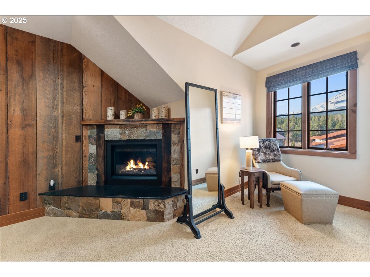 30930 Tyrolean Lane Government Camp, OR 97028 - Photo 33 of 42 a living room with furniture a rug and a fireplace