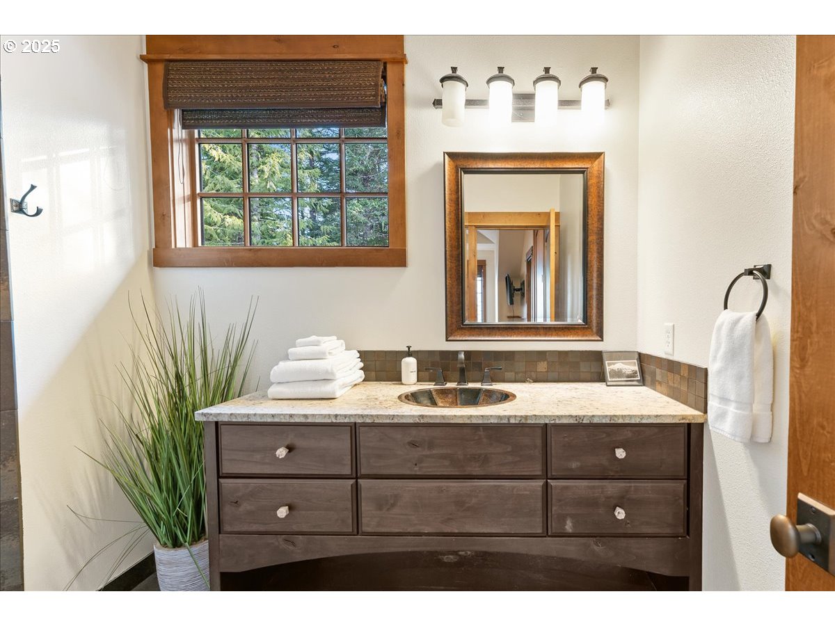 30930 Tyrolean Lane Government Camp, OR 97028 - Photo 38 of 42 a bathroom with a sink and a mirror