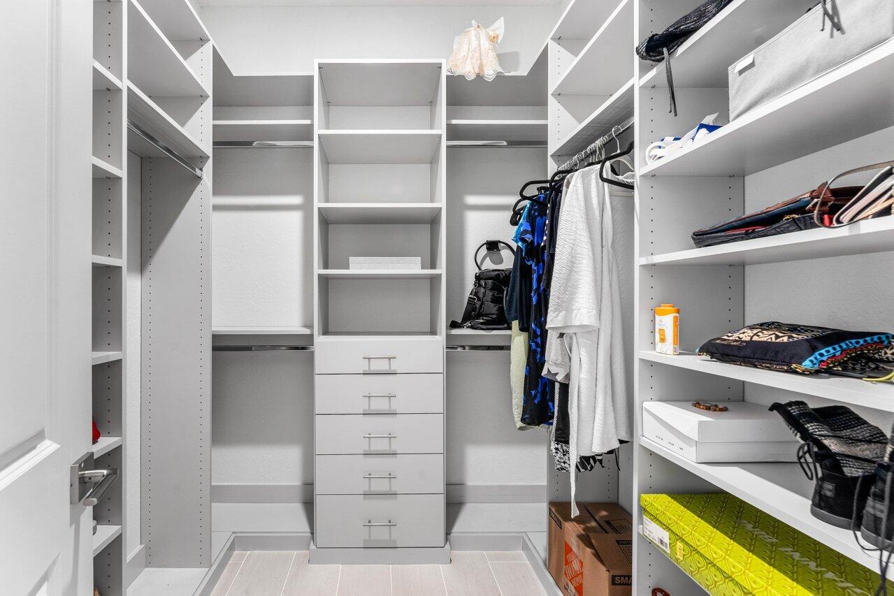 19743 Weathervane Way Loxahatchee, FL 33470 - Photo 25 of 70 Primary Custom walk-in closet (2)