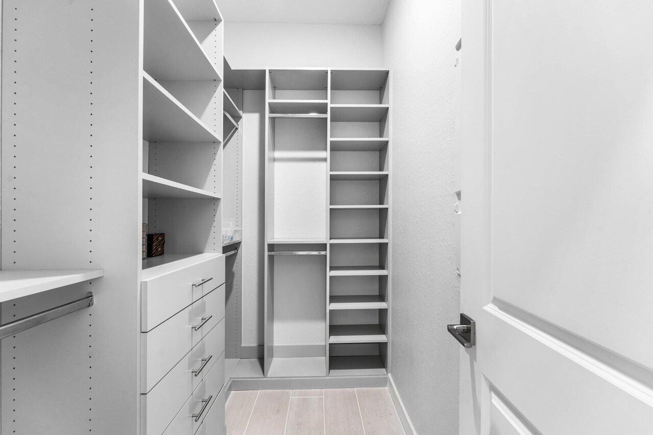 19743 Weathervane Way Loxahatchee, FL 33470 - Photo 26 of 70 Primary Custom walk-in closet (1)