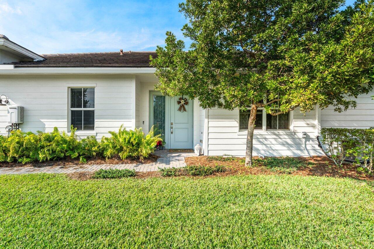 19743 Weathervane Way Loxahatchee, FL 33470 - Photo 5 of 70 lush landscaping surrounds the home