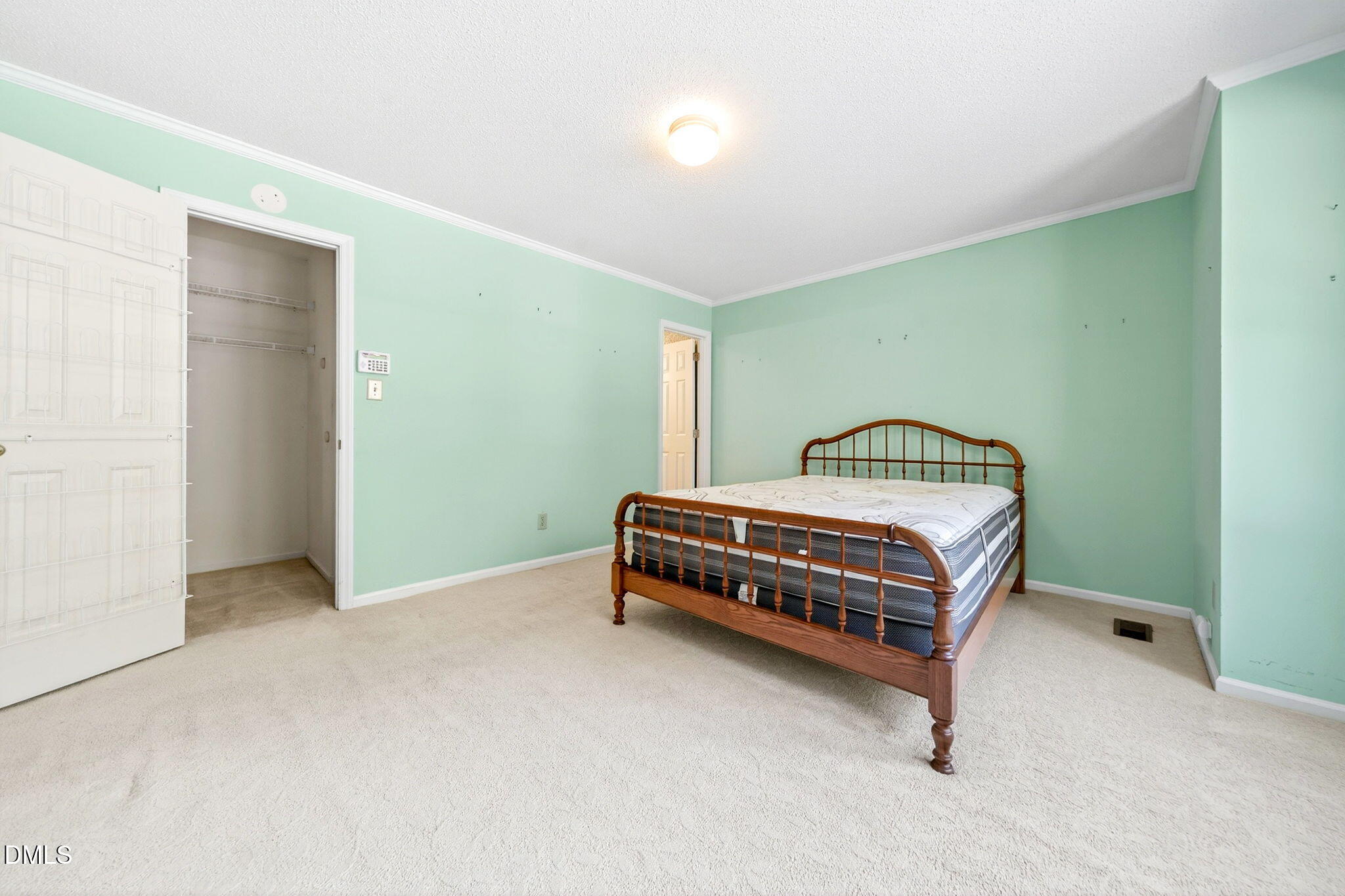 1423 Mahonia Court Raleigh, NC 27615 - Photo 15 of 34 Primary Bedroom