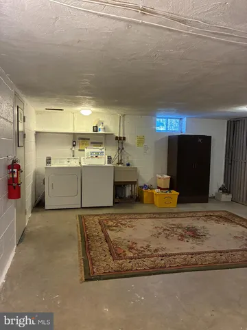 a view of a kitchen with a sink