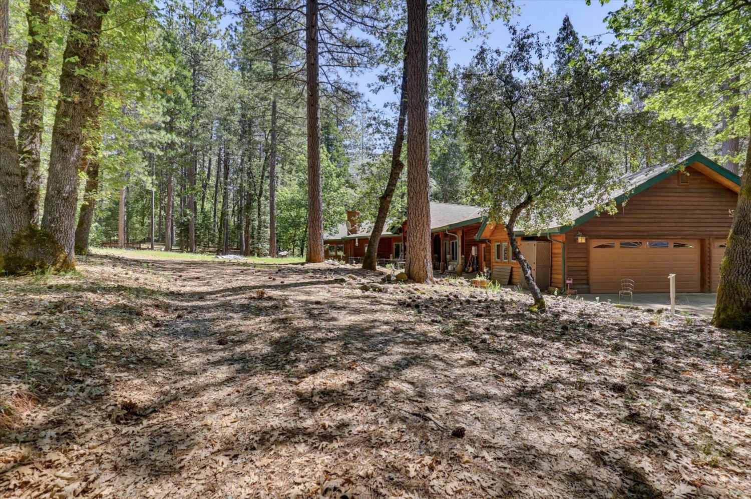 14517 North Bloomfield Road Nevada City, CA 95959 - Photo 56 of 78 a view of a house with a yard