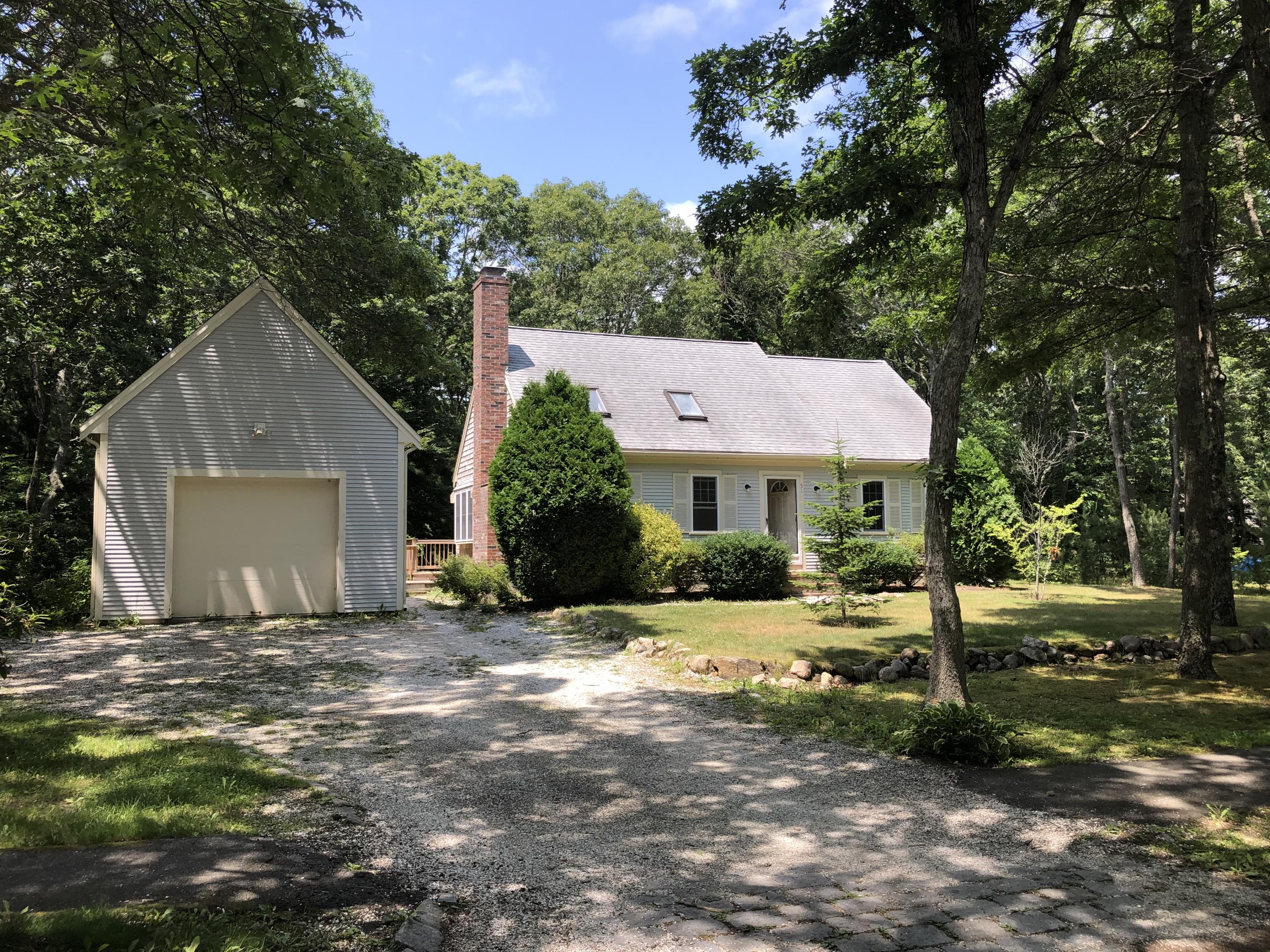 51 Quisset Road Centerville, MA 02632 - Photo 1 of 3 a view of a house with a yard