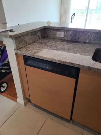 a bathroom with a shower and a toilet