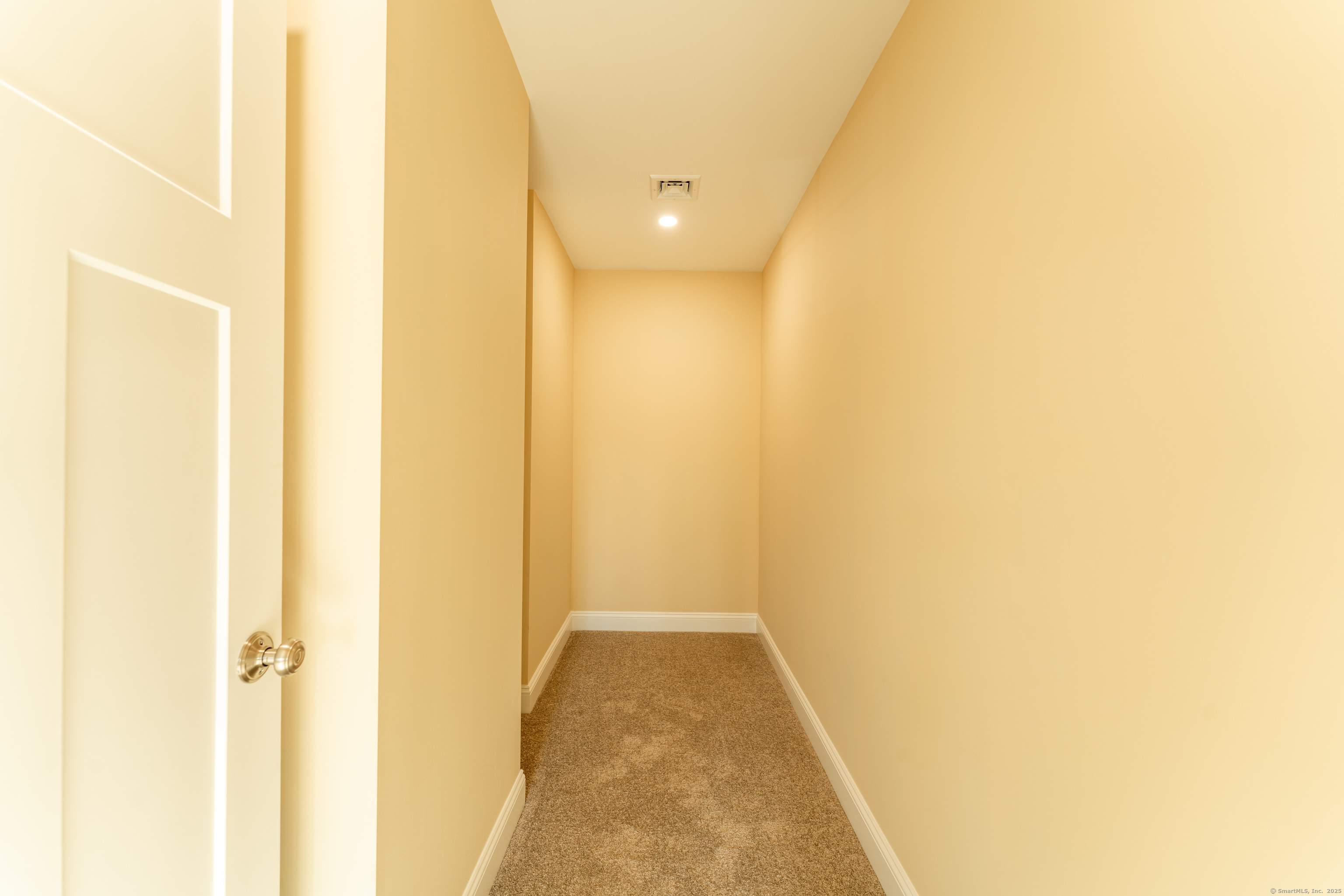 119 Bitgood Road Griswold, CT 06351 - Photo 19 of 29 a view of a hallway with wooden floor