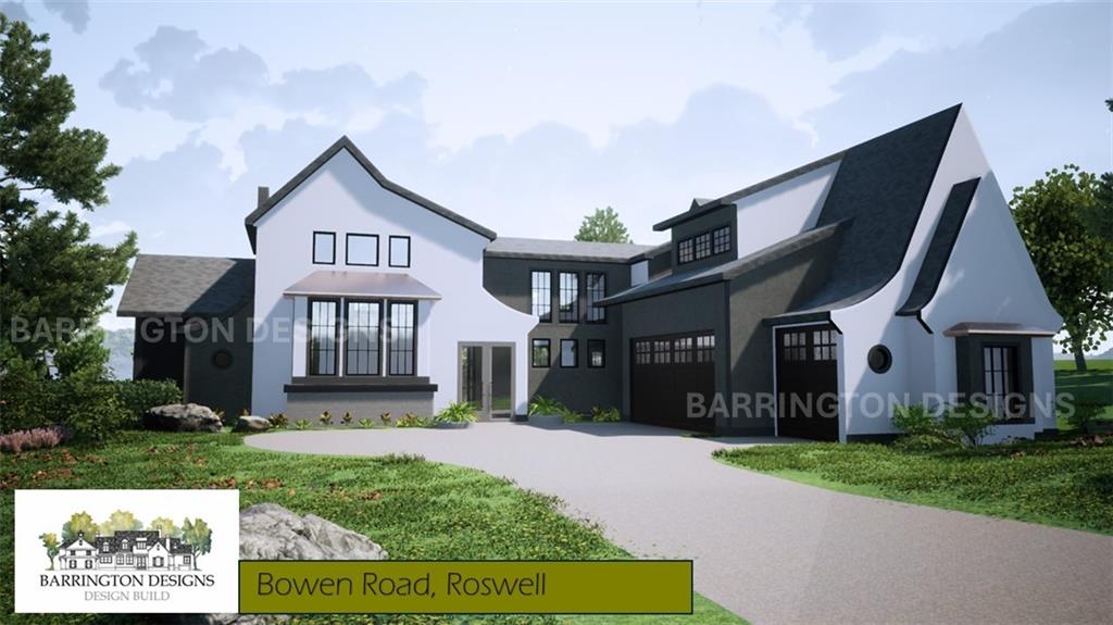 11115 Bowen Road Roswell, GA 30075 - Photo 4 of 12 a front view of a house with a yard and garage