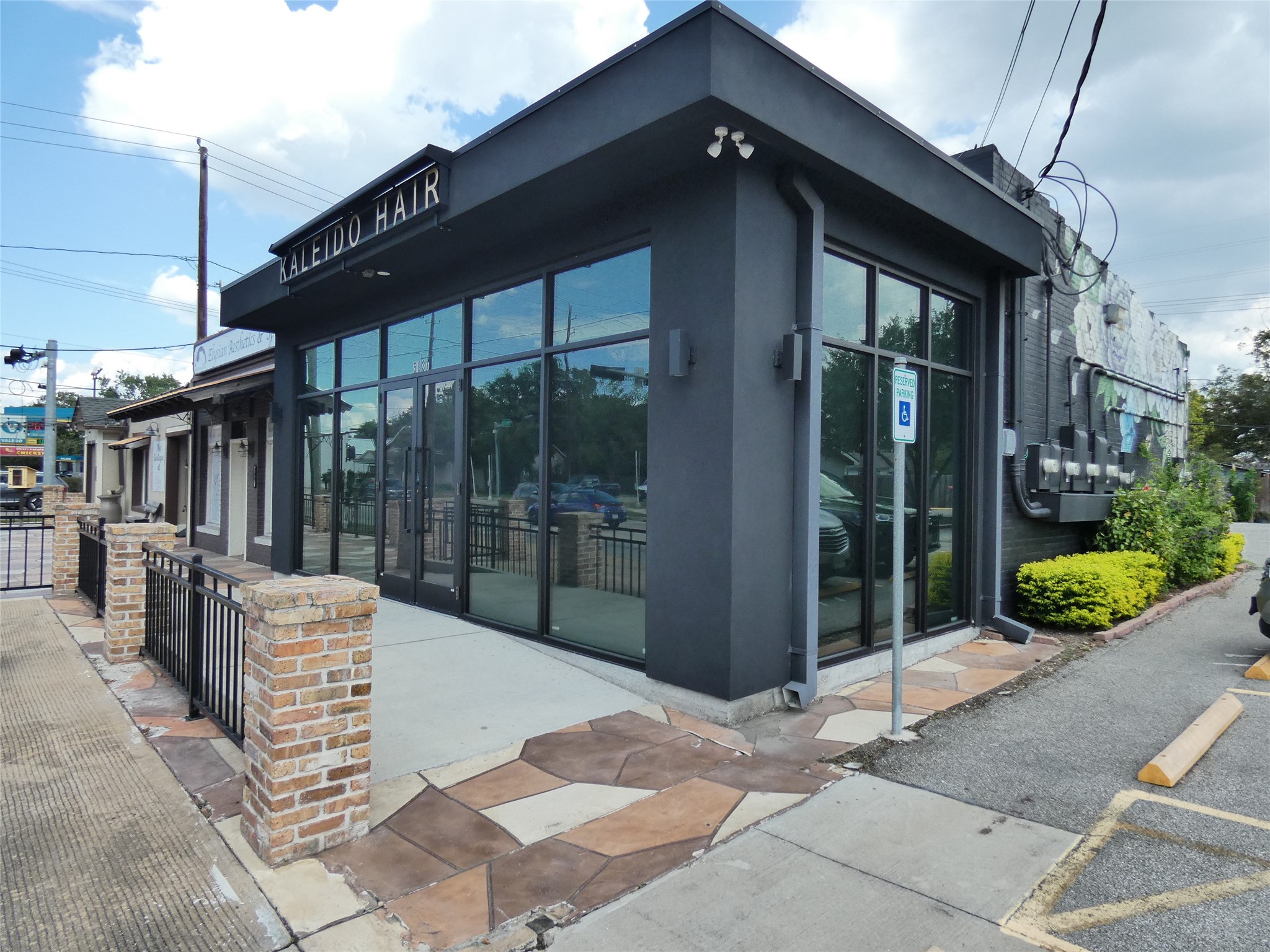 507 Houston Street, Unit 2 Rosenberg, TX 77471 - Photo 20 of 20 a patio with yard glass top table and chairs