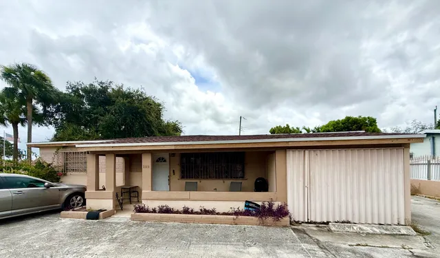 a view of house with outdoor space