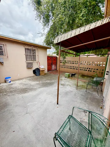a view of a porch with furniture