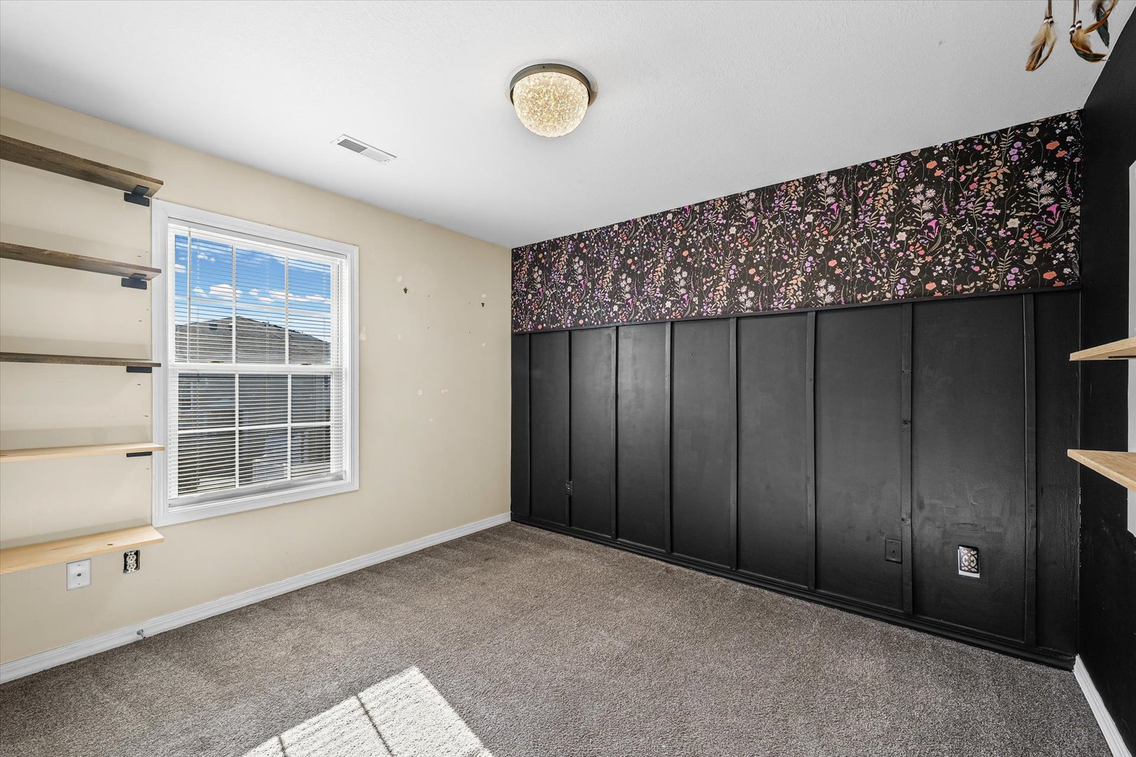 3725 Boulder Ridge Drive, Unit E Champaign, IL 61822 - Photo 19 of 30 a view of an empty room with a window