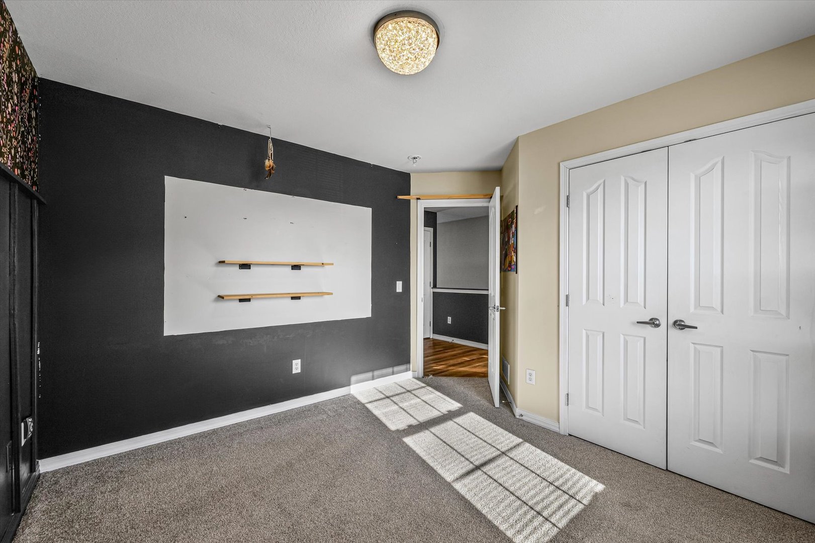 3725 Boulder Ridge Drive, Unit E Champaign, IL 61822 - Photo 20 of 30 a view of an empty room with a window