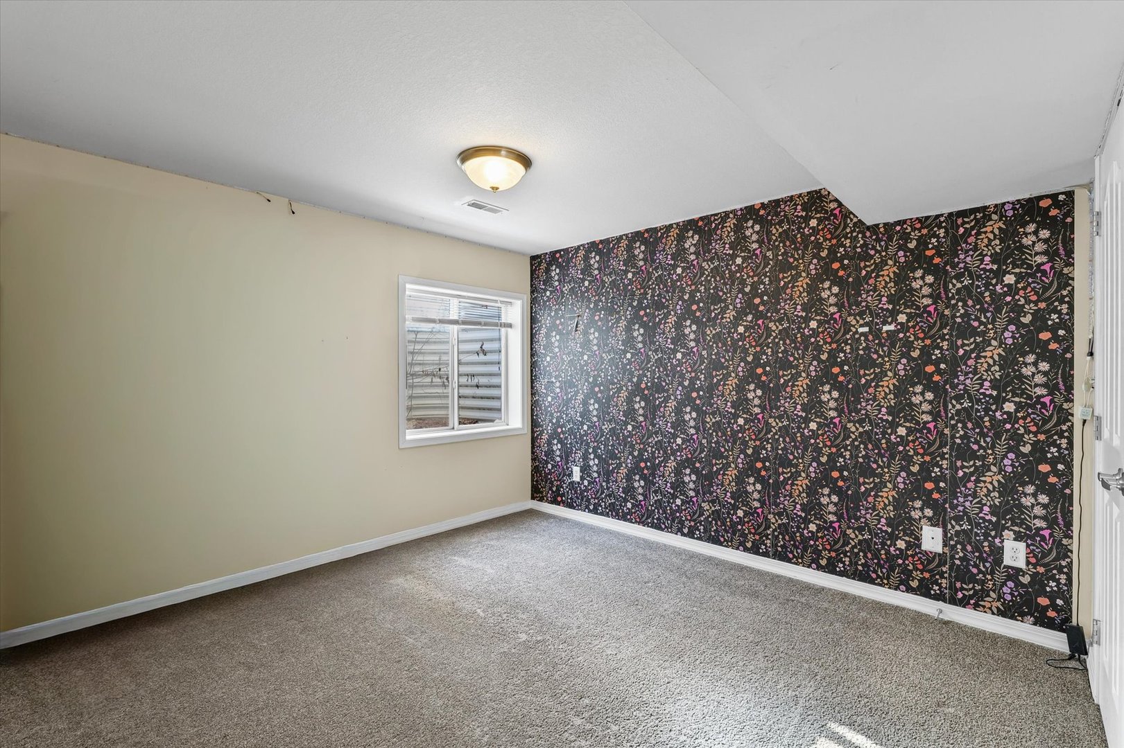 3725 Boulder Ridge Drive, Unit E Champaign, IL 61822 - Photo 24 of 30 a view of an empty room with a window