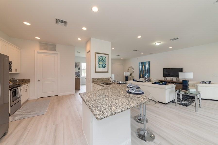 17889 63rd Road North Loxahatchee, FL 33470 - Photo 25 of 38 07_13171Orange_91_KitchenLivingRoom_LowR