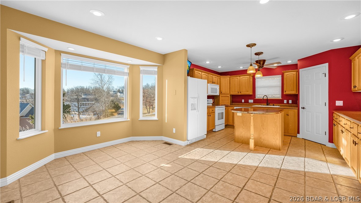 46 Watkins Road Camdenton, MO 65020 - Photo 12 of 60 Beautiful bay window in breakfast nook area