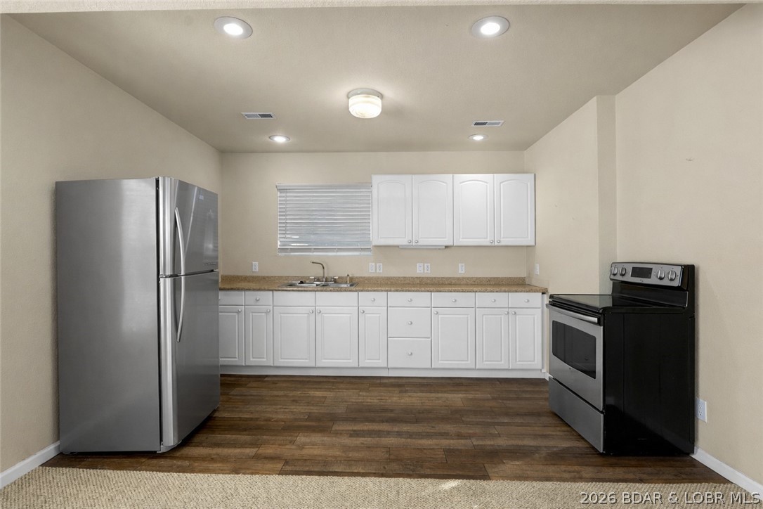 46 Watkins Road Camdenton, MO 65020 - Photo 34 of 60 Virtually staged with appliances.