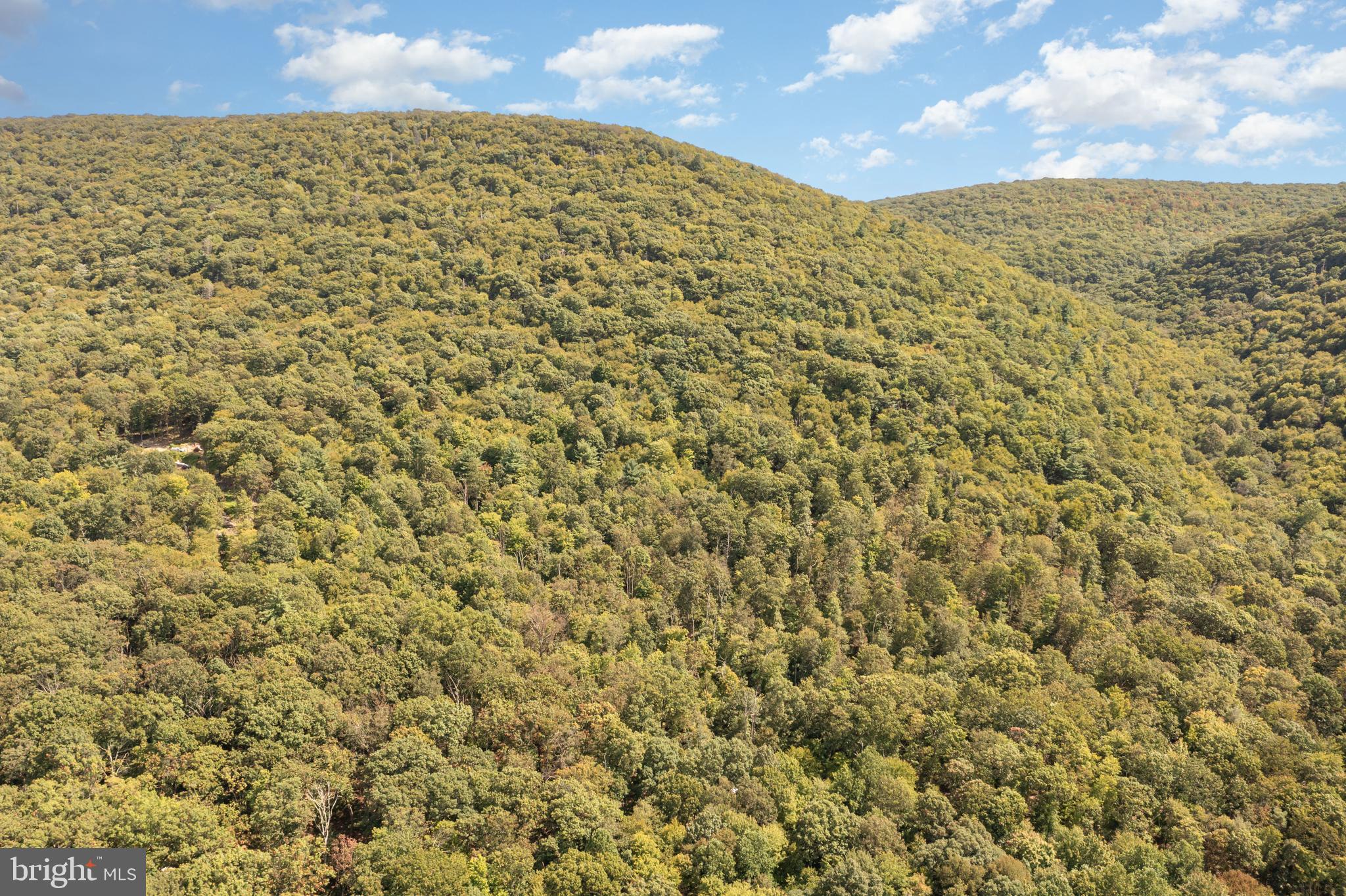 0 Wagner Road McClure, PA 17841 - Photo 4 of 7 a view of a large building with mountains in the background