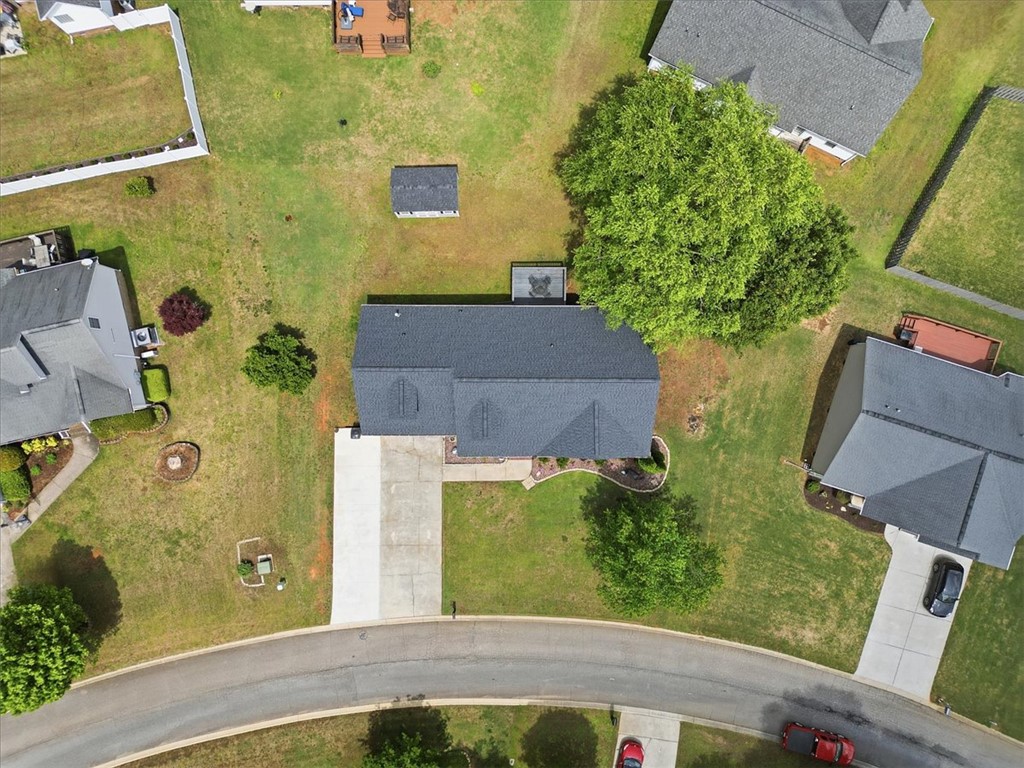 166 Amberwood Drive Anderson, SC 29621 - Photo 32 of 38 An aerial perspective reveals a home with a spacious yard and surrounding properties.