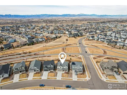 a view of a swimming pool with an outdoor seating