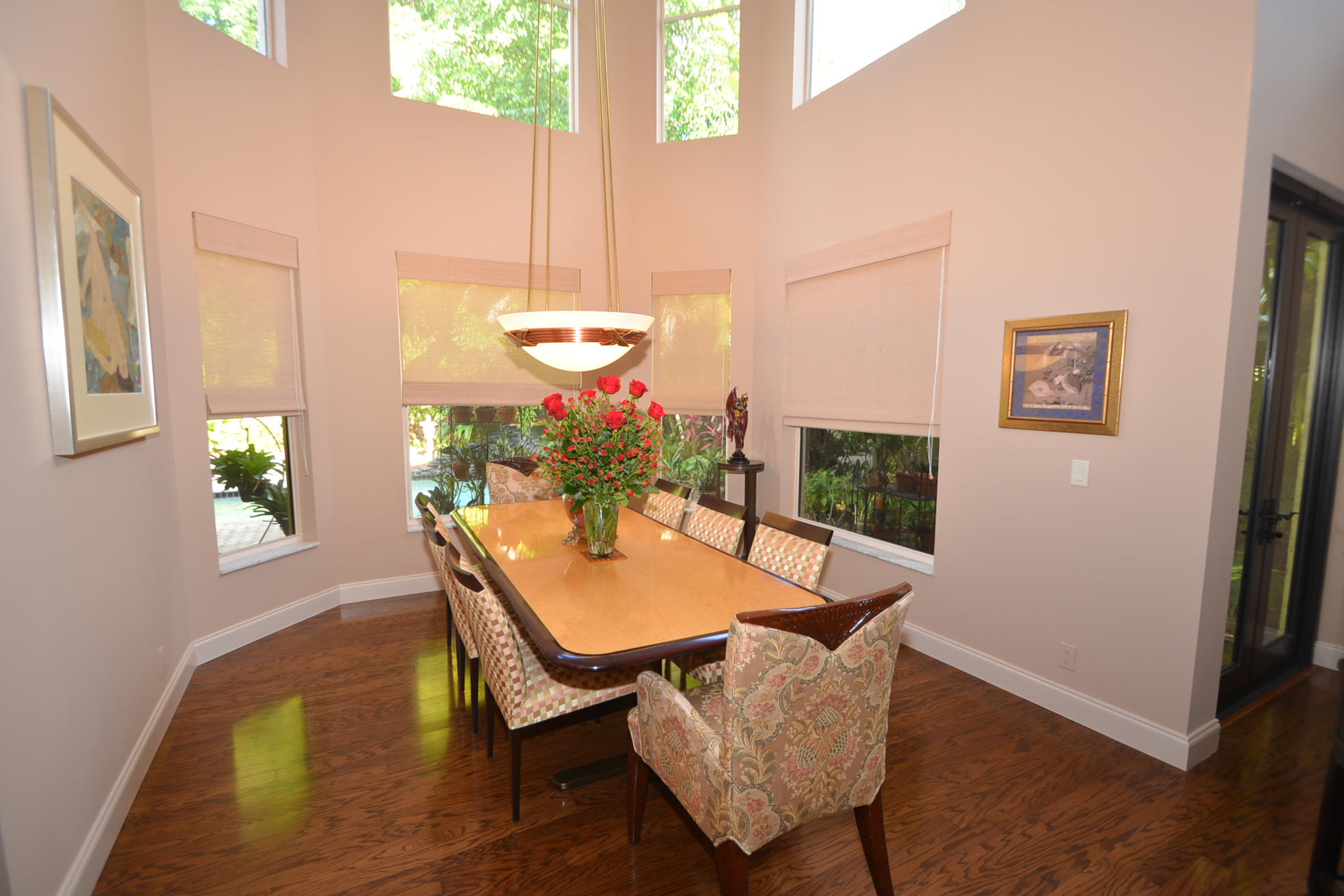 6390 Northwest 24th Avenue Boca Raton, FL 33496 - Photo 6 of 32 a view of a dining room with furniture and window
