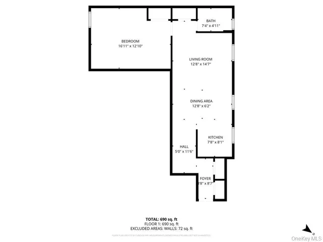 a picture of a bench in front of a wall