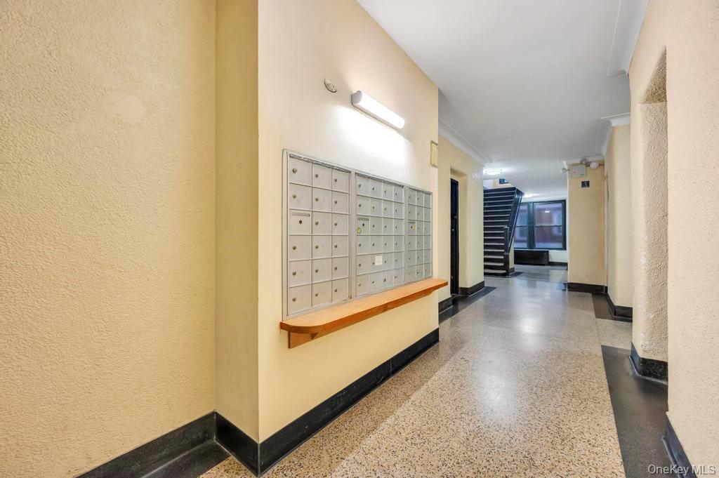 2020 East 41st Street, Unit 2B Brooklyn, NY 11234 - Photo 6 of 17 a view of gallery with stairs