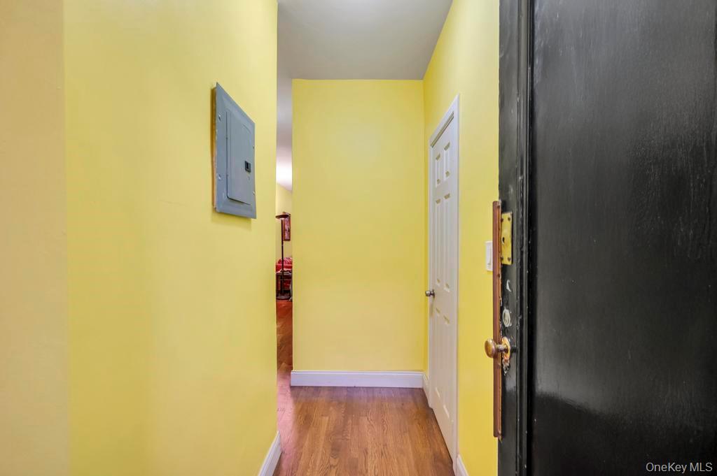 2020 East 41st Street, Unit 2B Brooklyn, NY 11234 - Photo 7 of 17 a view of a bathroom from a hallway