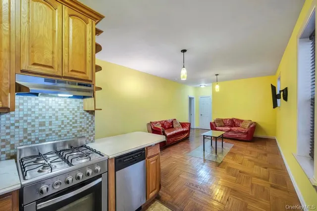 a kitchen with table and chairs