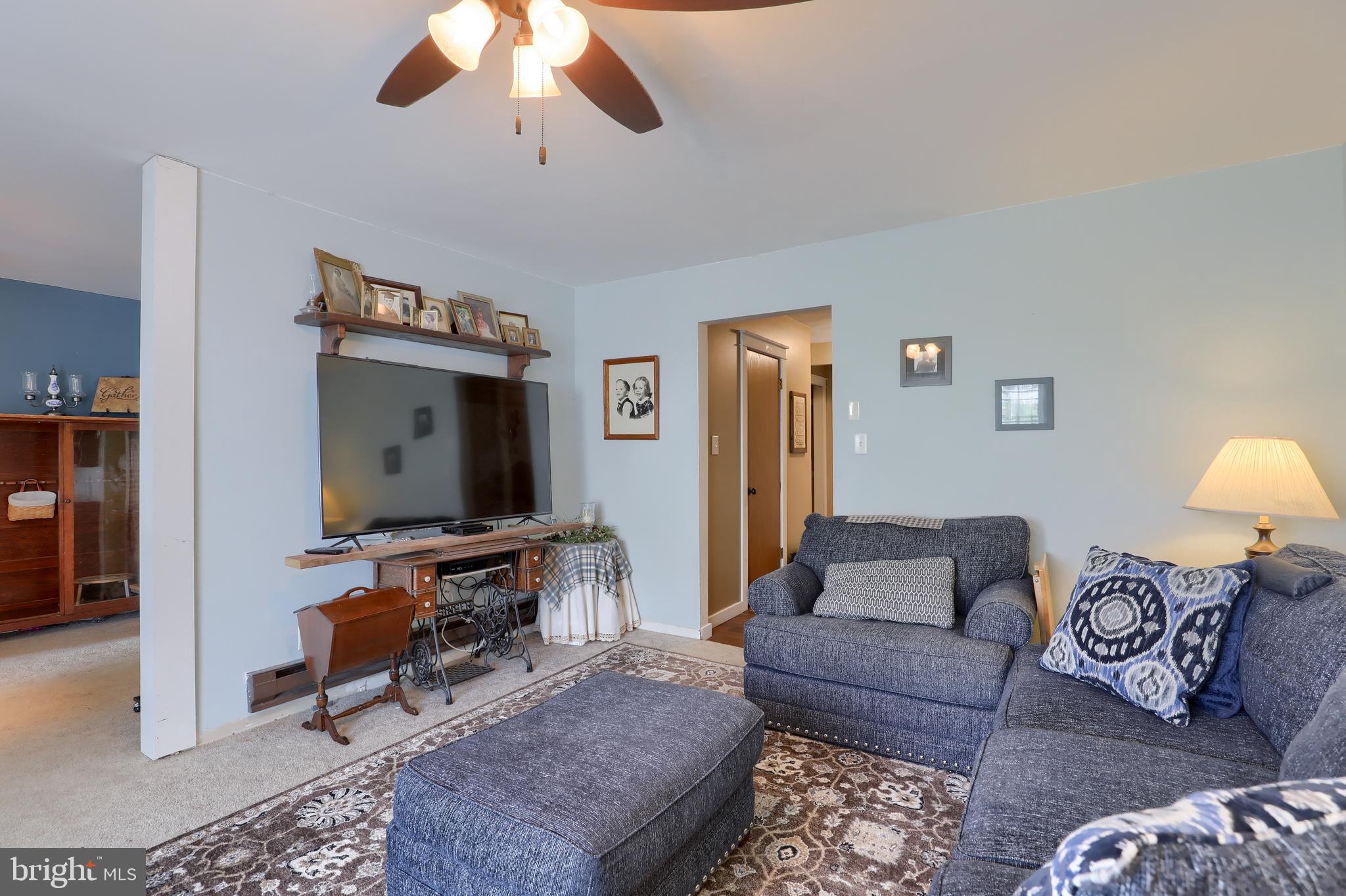 465 Crosswinds Drive Lititz, PA 17543 - Photo 14 of 30 a living room with furniture and a flat screen tv