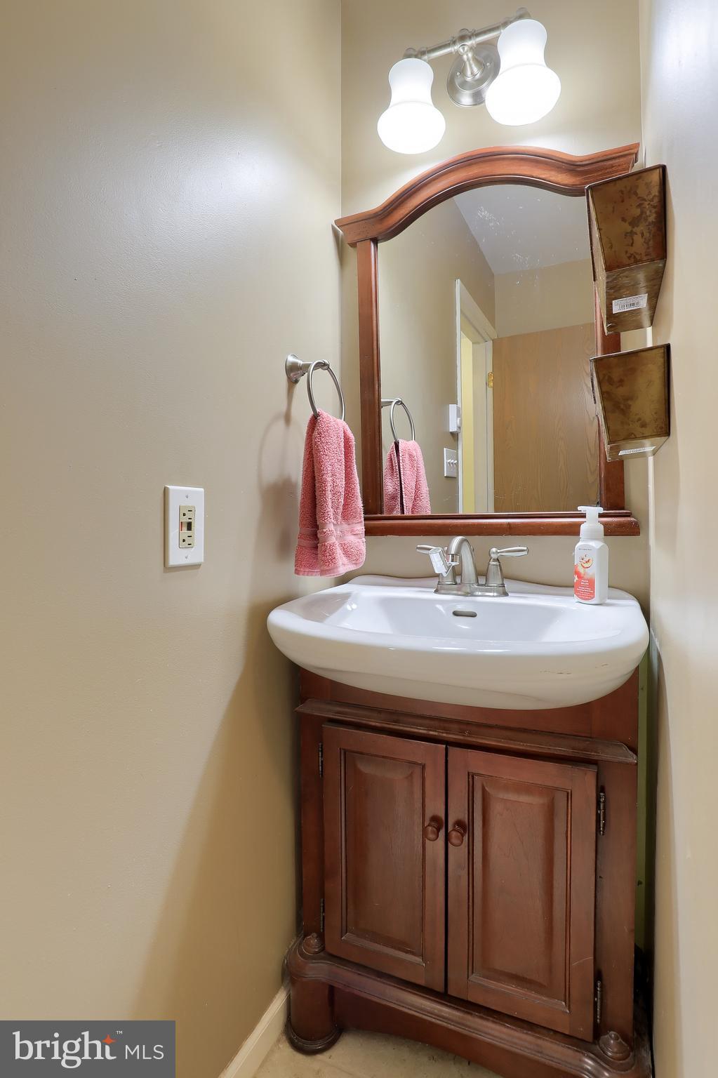 465 Crosswinds Drive Lititz, PA 17543 - Photo 24 of 30 a bathroom with a sink and a mirror