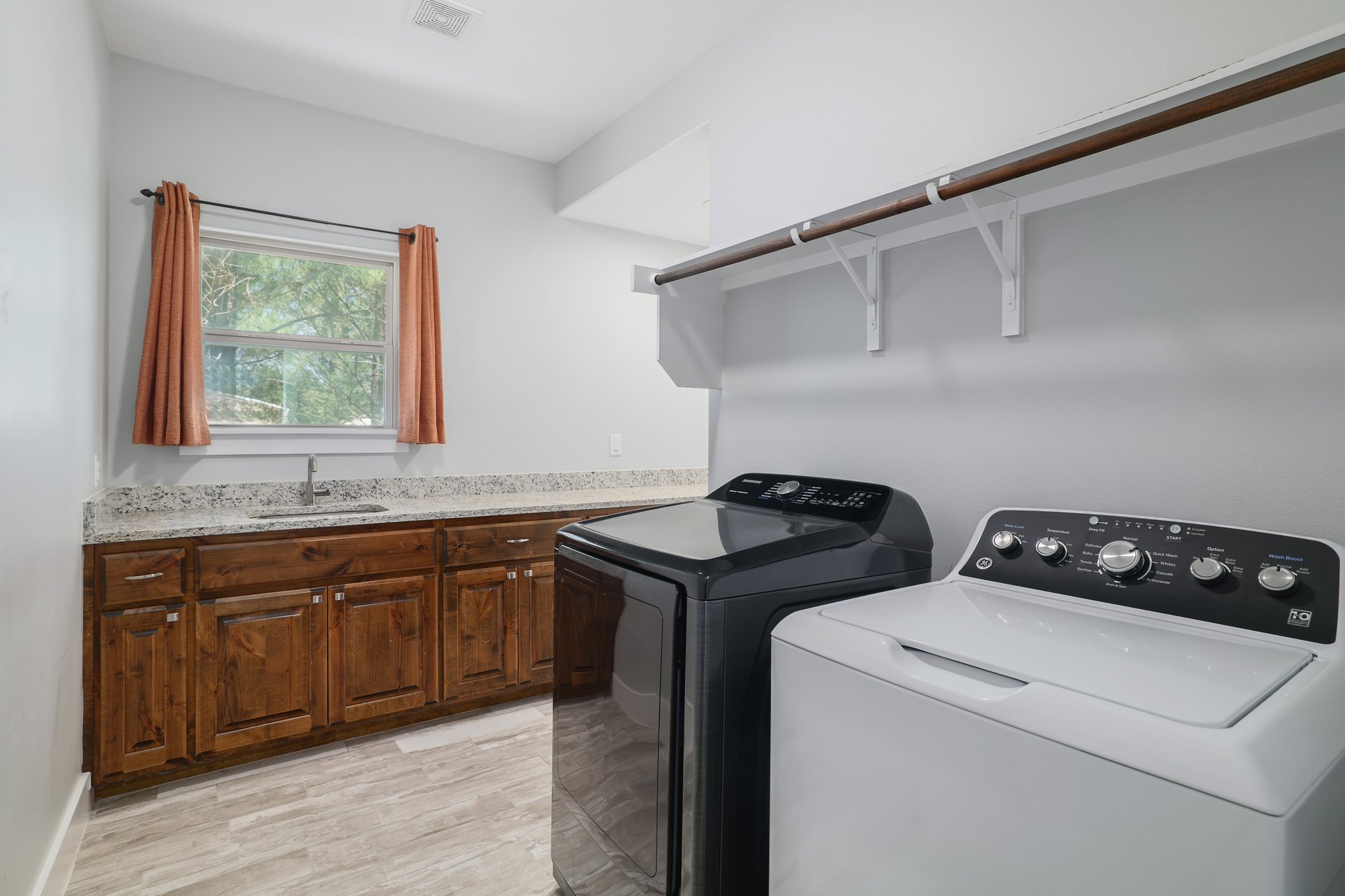258 County Road Bastrop, TX 78602 - Photo 21 of 32 a utility room with sink dryer and washer