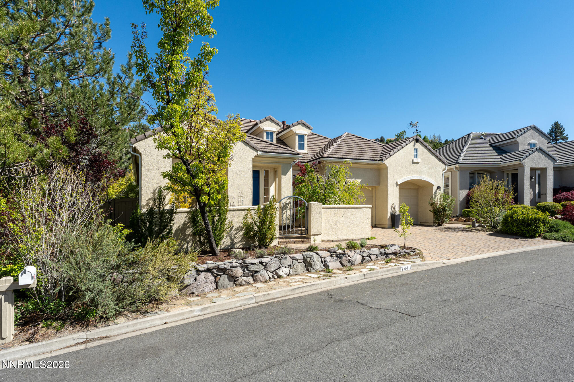1840 Hunter Creek Road Reno, NV 89519 - Photo 39 of 39 a front view of a house with a garden