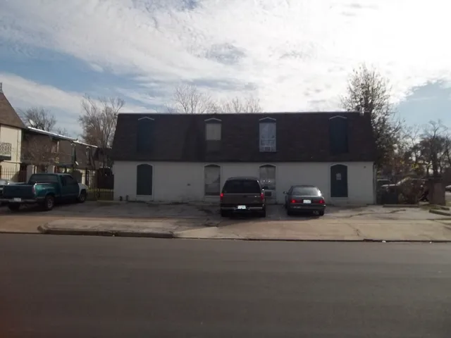 a car parked in front of a house