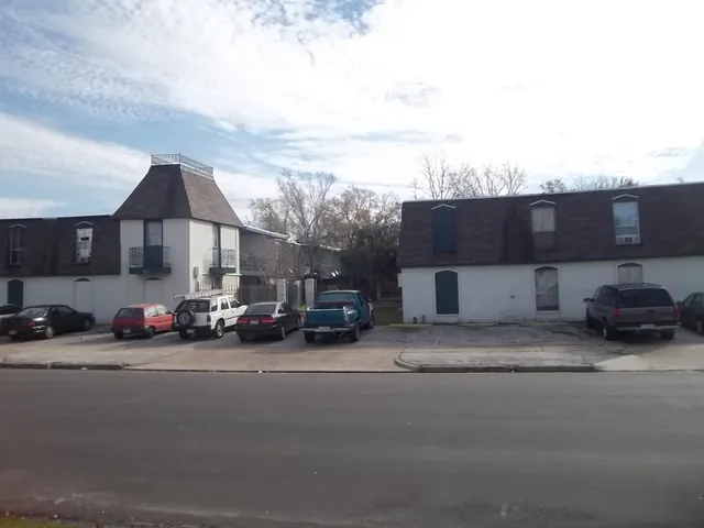 a view of a cars in front of a house