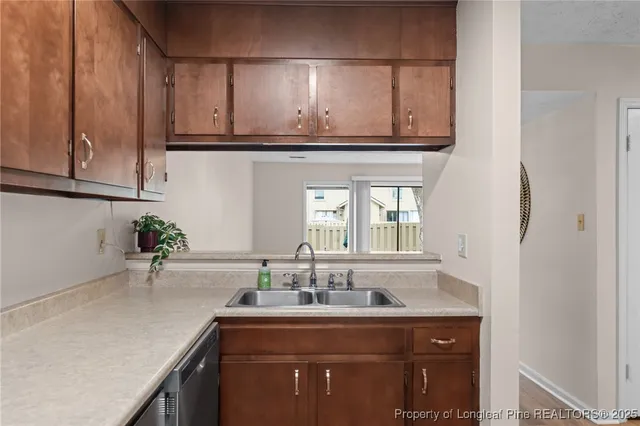 a kitchen with a stove and a microwave