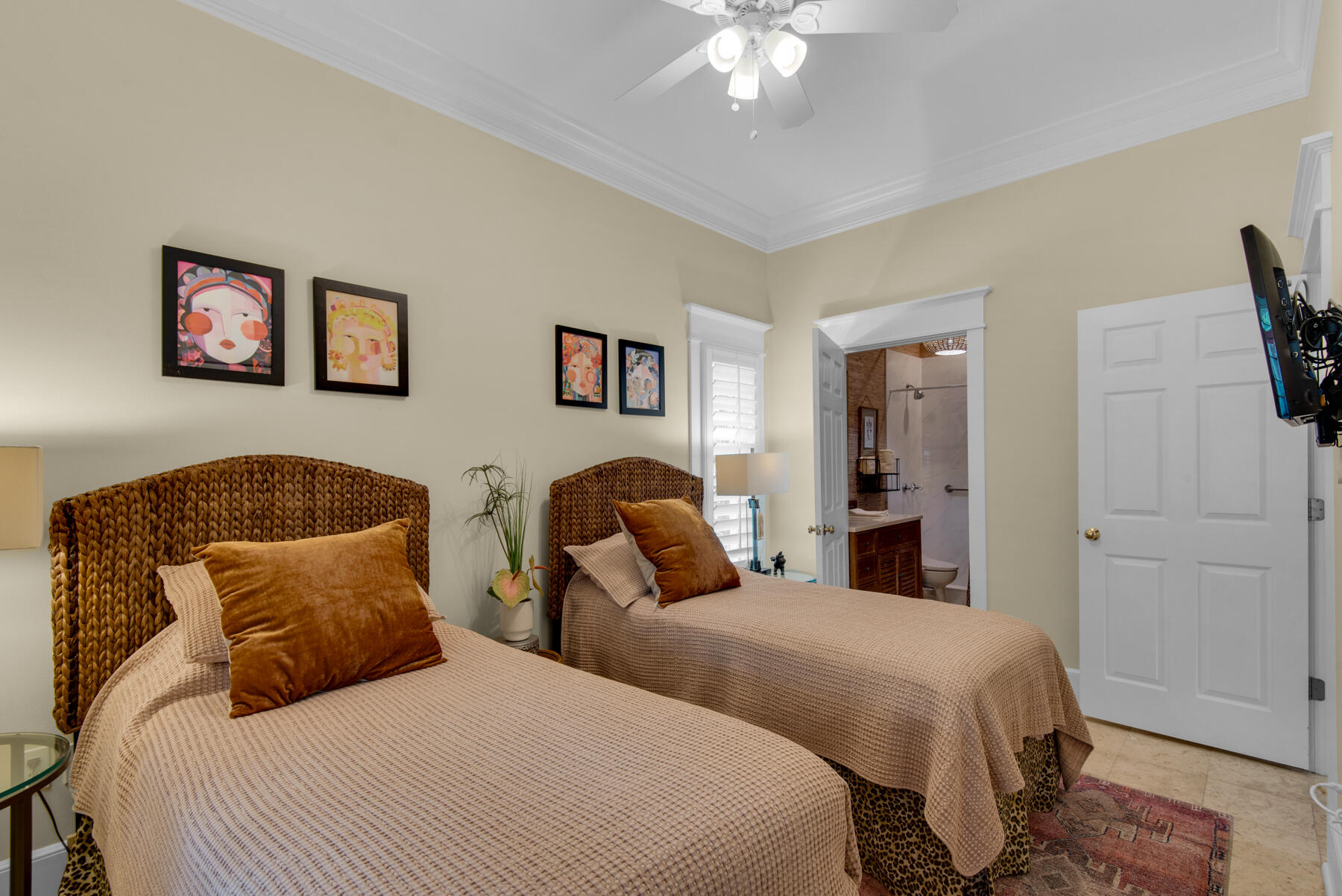 61 Rue Caribe Miramar Beach, FL 32550 - Photo 20 of 69 a bedroom with two beds and a chandelier